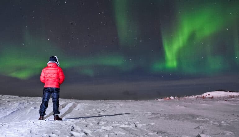 How do cosmic rays from outer space enter Earth’s atmosphere?