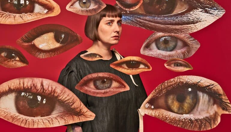 Cutouts of people's eyes surround a nervous looking woman.
